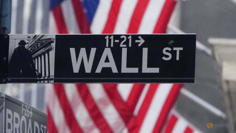 Nasdaq hits correction, Dow advances as stimulus bill nears finish line