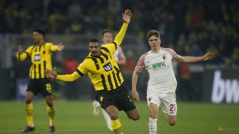 Dortmund earn rollercoaster 4-3 win over Augsburg on Haller return Dortmund earn rollercoaster 4-3 win over Augsburg on Haller return