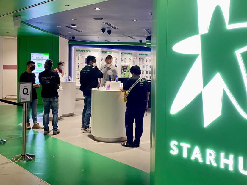 A scene at a StarHub store. A scene at a StarHub store.