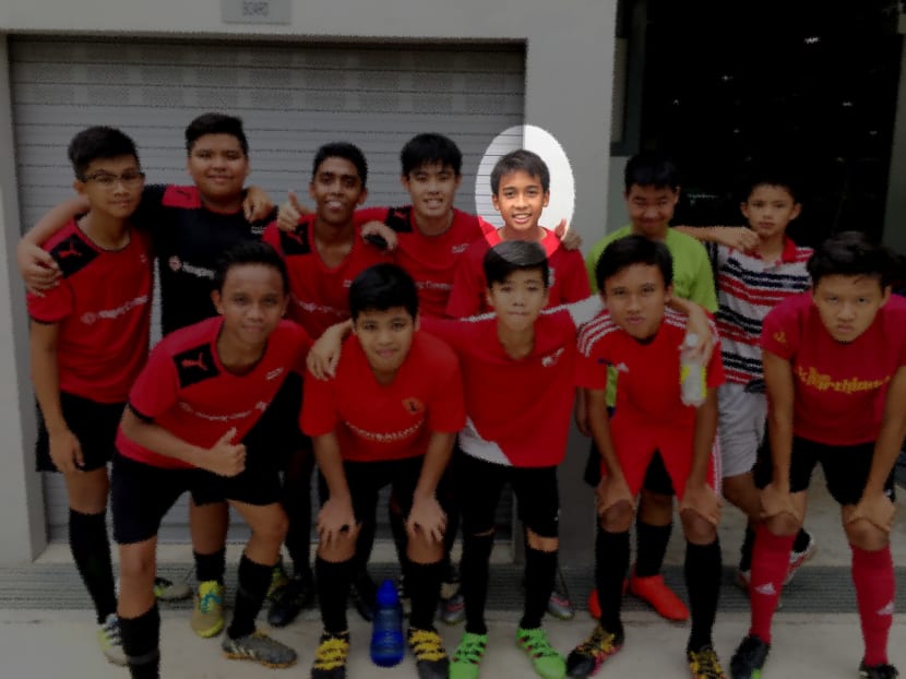 Muhammad Hambali Sumathi (back row, third from right) and his team mates from the boys’ football club, Youth Guidance Ethos. Photo: Youth Guidance Ethos