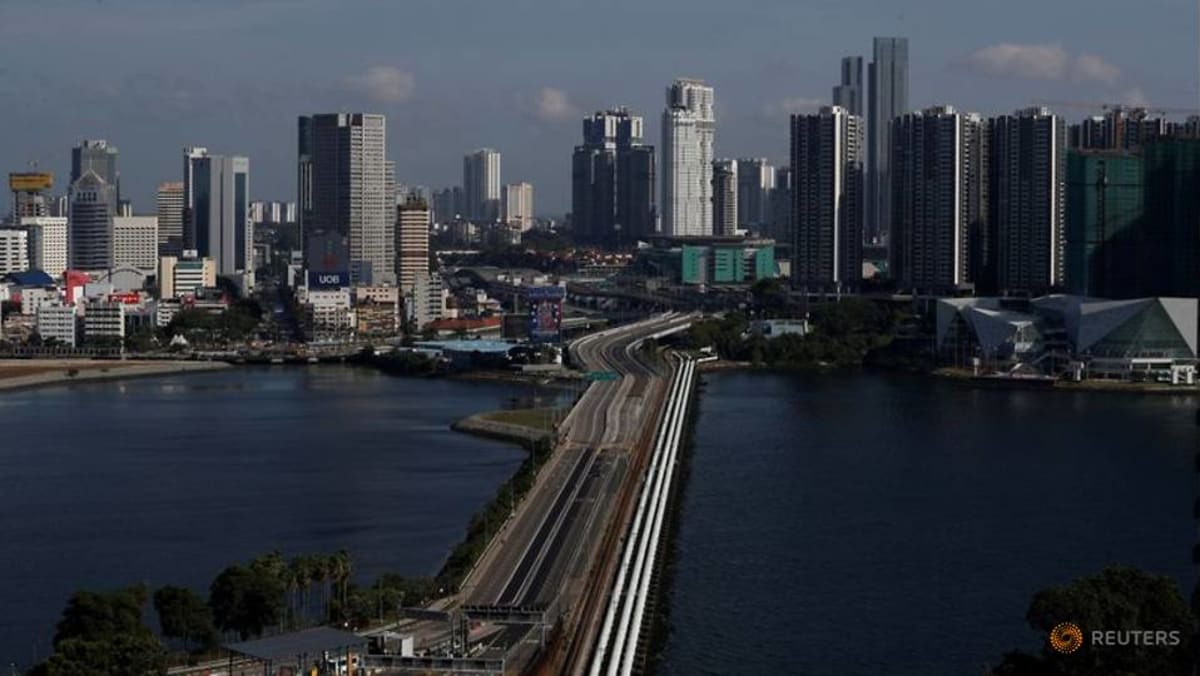 file photo a view of the empty woodlands causeway between singapore and malaysia after malaysia imposed a lockdown on travel due to the coronavirus disease covid 19 outbreak 1