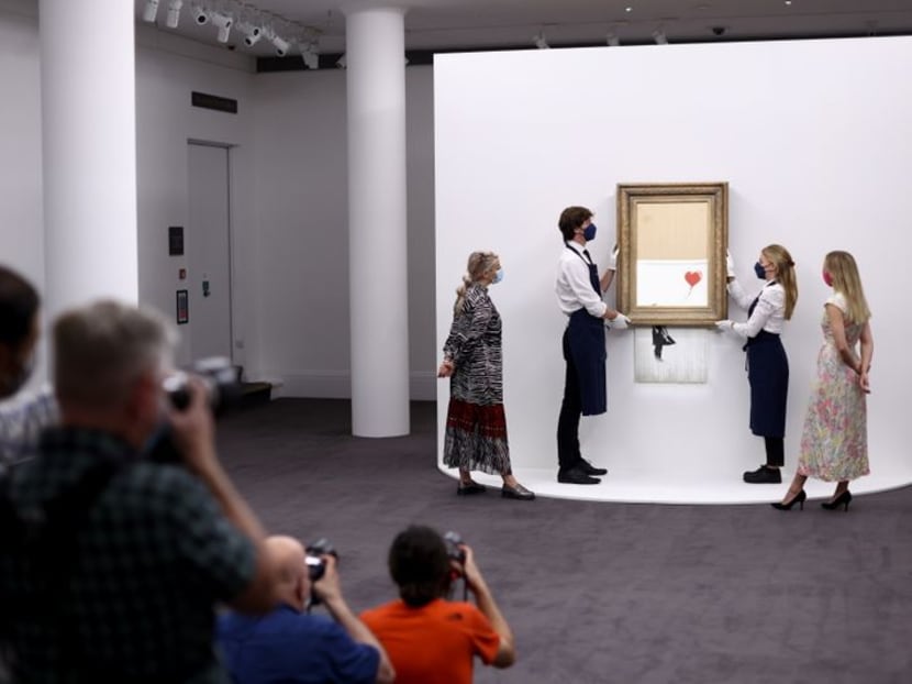 Three years on, shredded Banksy artwork returns to auction Three years on, shredded Banksy artwork returns to auction