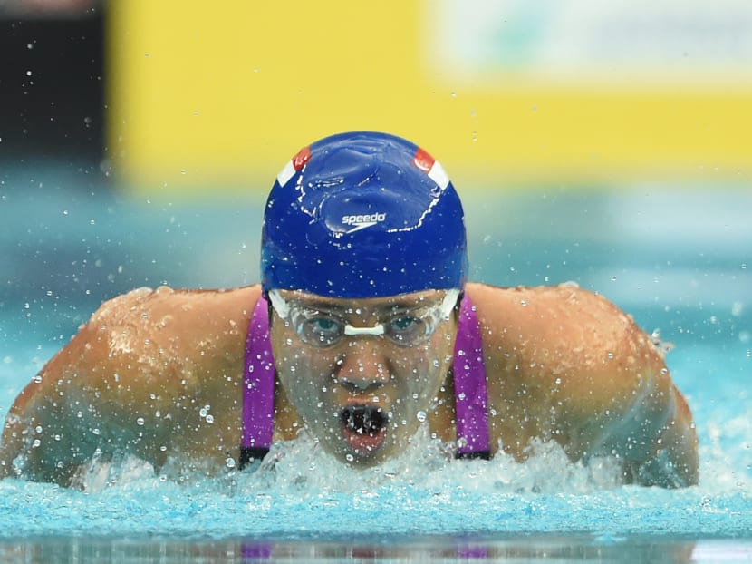 Singapore's Tao Li competes in the heats for the women's 100m butterfly swimming event during the 17th Asian Games at the Munhak Park Tae-hwan Aquatics Centre in Incheon on Sept 23, 2014. Photo: AFP