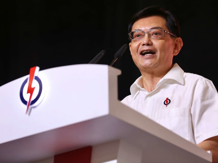 Deputy Prime Minister Heng Swee Keat speaking at a gathering of about 2,500 PAP activists at the PAP65 Awards and Convention at the Singapore Expo on Nov 10.