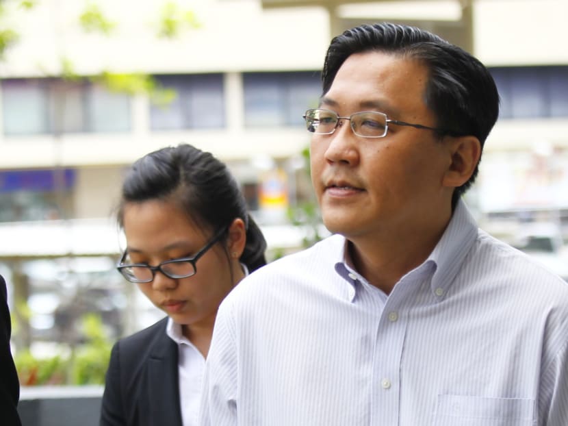 Assistant director of the Corrupt Practices Investigation Bureau (CPIB) Edwin Yeo, who was charged in July with 21 offences including misappropriation and forgery, arriving at the Subordinate court on Feb 20, 2014. Photo: Ernest Chua.