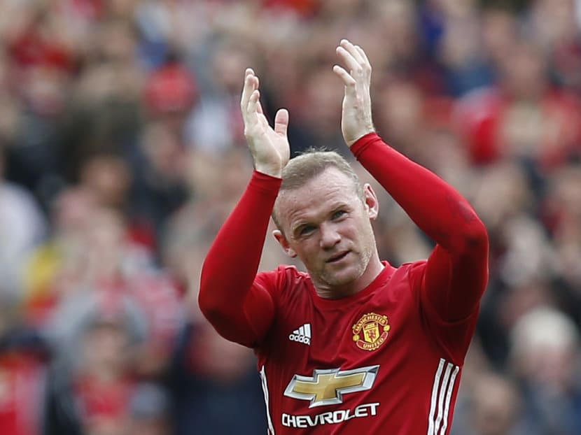 Chinese football experts say the result of the new rules on spending on foriegn players means that clubs will trim spending and revert to looking at players at the end of their careers - like Wayne Rooney. Photo: Reuters