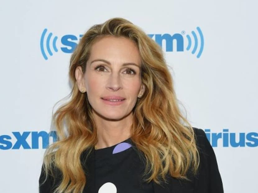 Brad Pitt, George Clooney or Tom Hanks? Julia Roberts picks desert island companion Brad Pitt, George Clooney or Tom Hanks? Julia Roberts picks desert island companion
