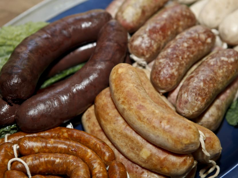 Eating processed meat, like hot dogs and corned beef, can raise the risk in humans of getting colon cancer, a report released Oct 26, 2015 by the World Health Organization said. Photo: The New York Times