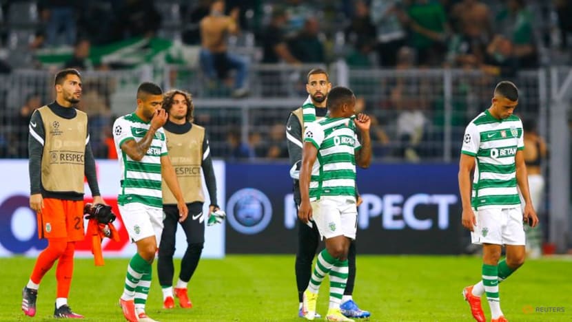 Malen's maiden goal hands Dortmund 1-0 win over Sporting Malen's maiden goal hands Dortmund 1-0 win over Sporting