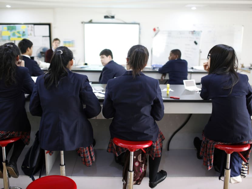 Students attending a class at a private school in Changzhou, Jiangsu province. The Chinese government’s recent decision 

to ban all private, for-profit schools aims to promote equal access to basic education. Photo: Reuters