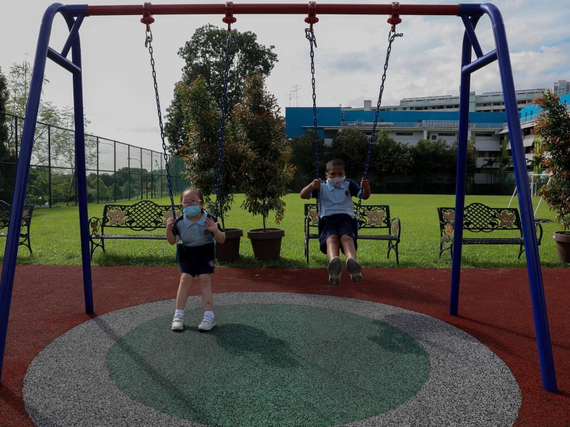 Pupils on the swing at the iSpace playground in Chaoyang School.