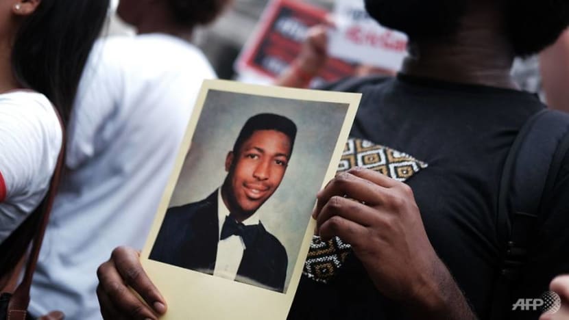 US policeman suspended over choking death of black man US policeman suspended over choking death of black man