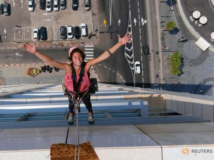 Squeegee selfies: Tel Aviv tower-washer is rising TikTok star Squeegee selfies: Tel Aviv tower-washer is rising TikTok star