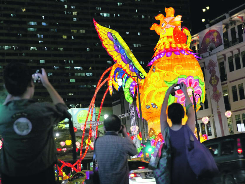 The annual Chinatown Street Light-Up for Chinese New Year featured 5,500 lanterns using environmentally friendly LED lights. The centrepiece is a 13m-tall rooster lantern at the junction of Eu Tong Sen Street and Upper Cross Street. Photo: Nuria Ling/TODAY