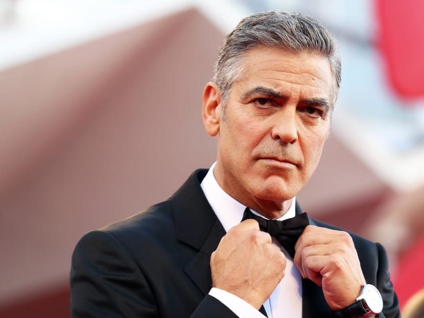 Gallery: Clooney, Bullock launch Venice into orbit with Gravity