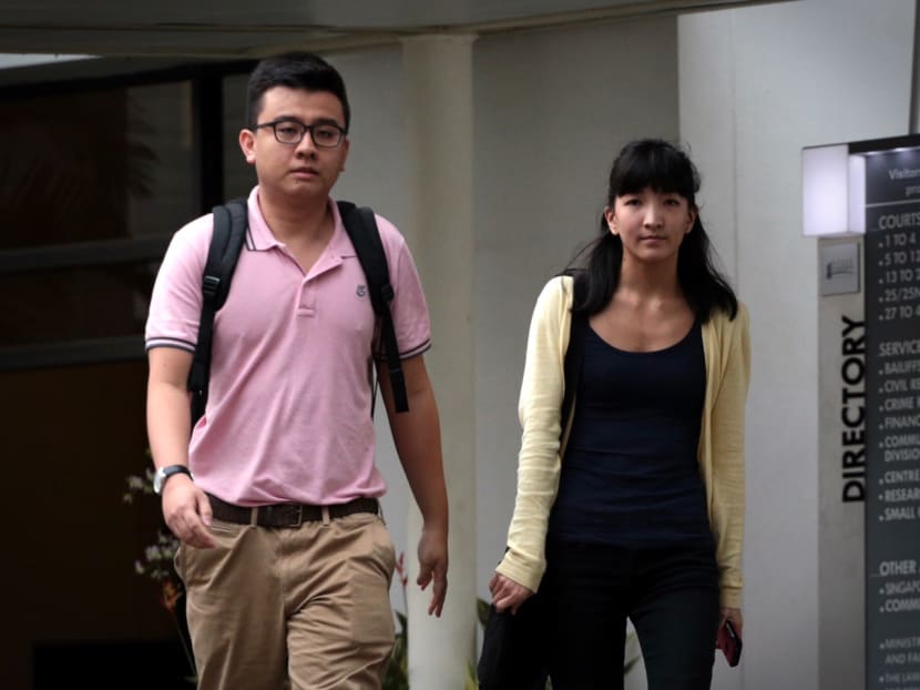 The duo behind The Real Singapore, Yang Kaiheng (left) and Ai Takagi (right), leaving court on May 4, 2015. Photo: Jason Quah