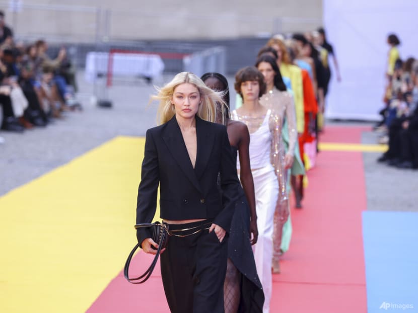 Stella McCartney collaborates with Japanese artist Yoshitomo Nara in artsy show at Paris Fashion Week Stella McCartney collaborates with Japanese artist Yoshitomo Nara in artsy show at Paris Fashion Week