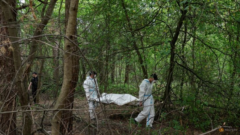 Ukraine exhumes seven bodies of people it says were killed by Russian forces Ukraine exhumes seven bodies of people it says were killed by Russian forces