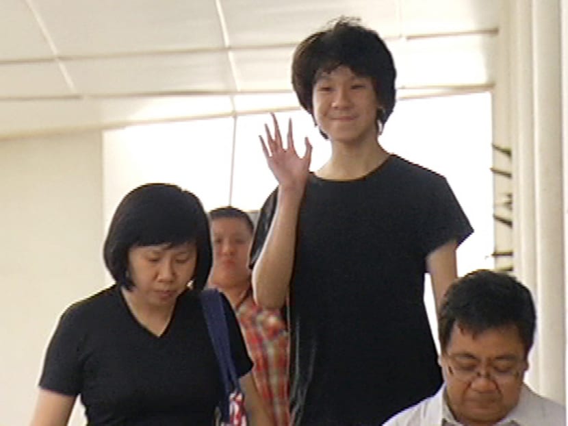 Amos Yee leaving the State Courts with his parents on March 31, 2015. Photo: Channel NewsAsia