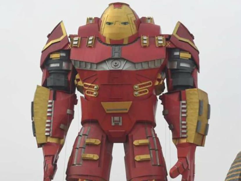 The new statue is painted in iconic red and yellow colours of Marvel Comics superhero Ironman, but its bulk bears more similarity to an Autobot from American film franchise Transformers. Photo: Animation Innovation Park in Chuzhou