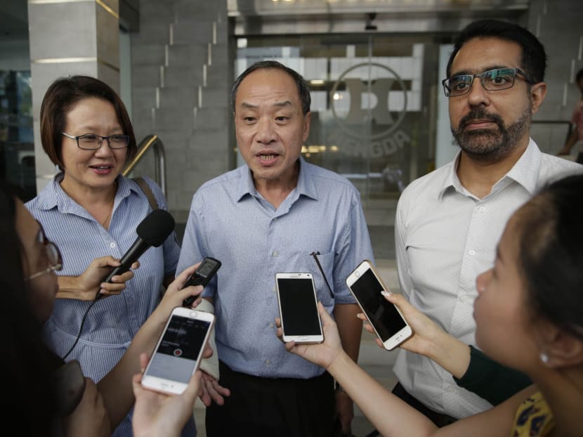 (From left to right) Workers' Party Chairman Sylvia Lim, Secretary-General Low Thia Khiang, and Member of Parliament Pritam Singh speak to the media after the party's Central Executive Committee elections meeting on May 29, 2016. Photo: Wee Teck Hian/TODAY