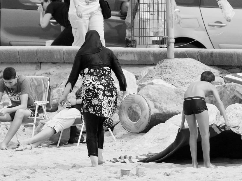 In an attempt to reassure the public, several French coastal cities have banned the burkini, the full-body swimsuit some Muslim women wear to the beach. However, the problem is not Islam, as many populists claim, and as the burqa and burkini bans suggest. Photo: Reuters