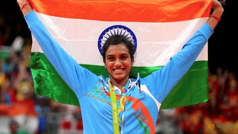 Badminton-India's Sindhu forges ahead in empty stadium Badminton-India's Sindhu forges ahead in empty stadium