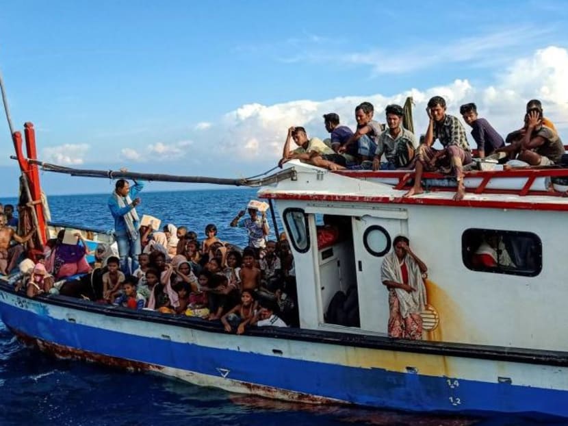 Rohingya refugees are seen on a boat while being rescued by fishermen near the coast of Seunuddon beach in Aceh, Indonesia, on Wednesday, June 24, 2020. Rohingya refugees are seen on a boat while being rescued by fishermen near the coast of Seunuddon beach in Aceh, Indonesia, on Wednesday, June 24, 2020.