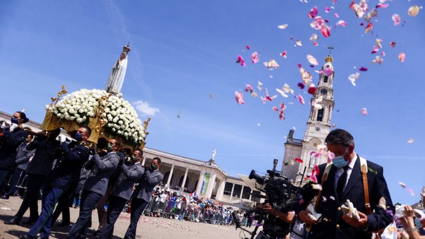 'Not free from COVID-19': Thousands pray at Portuguese shrine despite fears of new wave 'Not free from COVID-19': Thousands pray at Portuguese shrine despite fears of new wave