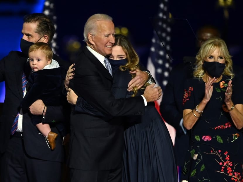 US president-elect Joe Biden hugging one of his granddaughters as he stands with wife Jill Biden (far right), and grandson and son Hunter Biden (left) in Wilmington, Delaware, on Nov 7, 2020, after he was declared the winner of the presidential election. US president-elect Joe Biden hugging one of his granddaughters as he stands with wife Jill Biden (far right), and grandson and son Hunter Biden (left) in Wilmington, Delaware, on Nov 7, 2020, after he was declared the winner of the presidential election.