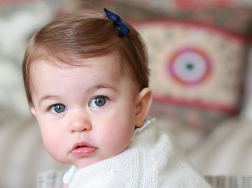 Britain's Princess Charlotte, daughter of the Duke and Duchess of Cambridge, Prince William and his wife Catherine, poses for a photograph in this undated photograph taken by her mother. Photo: Kensington Palace via Reuters