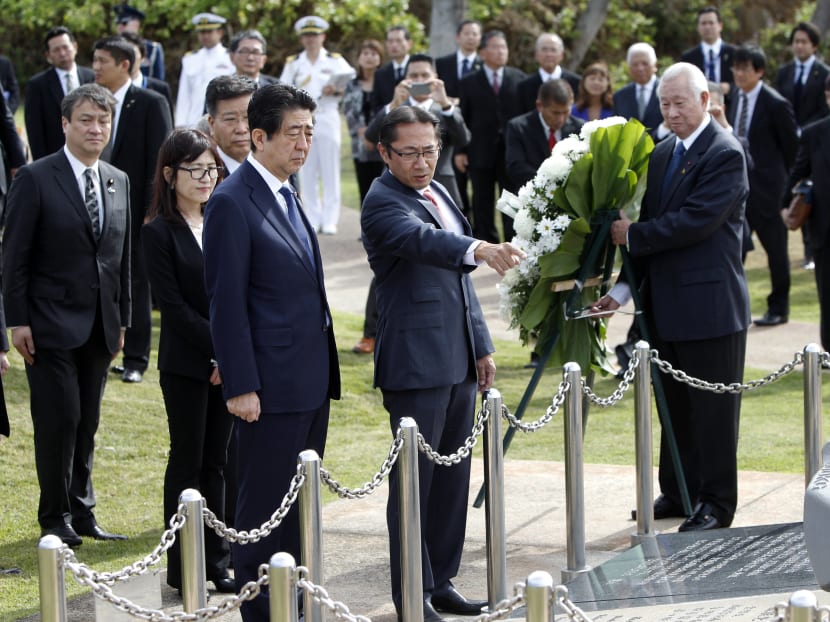 Gallery: Japanese prime minister arrives in Hawaii for memorial visit