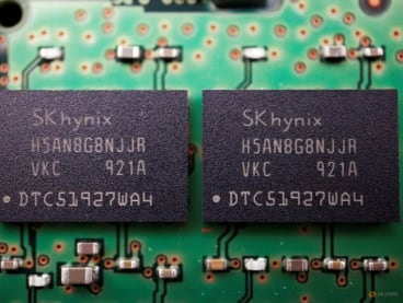 FILE PHOTO: Memory chips by South Korean semiconductor supplier SK Hynix are seen on a circuit board of a computer in this illustration picture taken February 25, 2022. REUTERS/Florence Lo/Illustration
