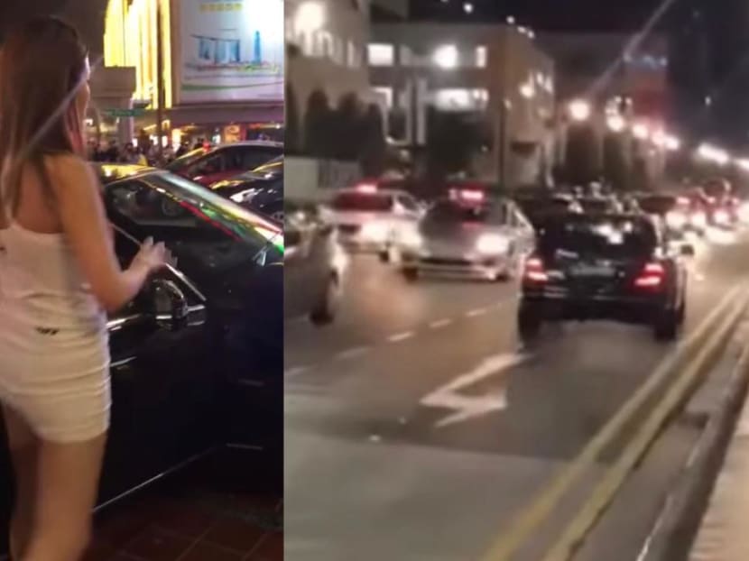 One video posted onto the Singapore Road Accident Facebook page shows the woman stepping out of the car — which had mounted the pavement — and using Hokkien vulgarities at a passersby. One video posted onto the Singapore Road Accident Facebook page shows the woman stepping out of the car — which had mounted the pavement — and using Hokkien vulgarities at a passersby.