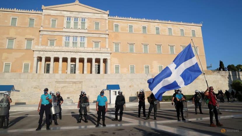 Greek police use tear gas, water canon during Athens COVID-19 vaccine protest Greek police use tear gas, water canon during Athens COVID-19 vaccine protest