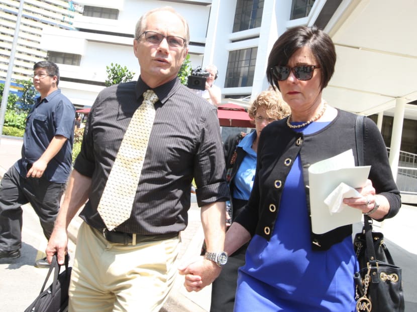 Rick (left) and Mary Todd (right), parents of Shane Todd leaving the subordinate courts on the first day of the coroner's inquiry. Photo: Don Wong