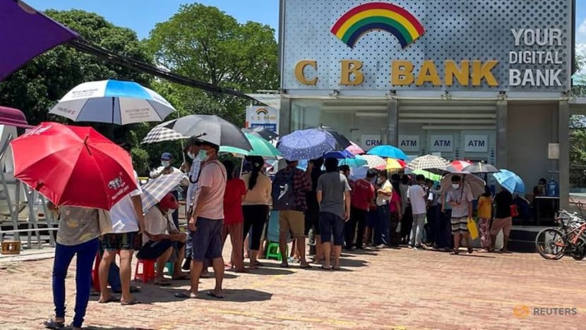 Lines, tokens and money brokers: Myanmar's crumbling economy runs low on cash Lines, tokens and money brokers: Myanmar's crumbling economy runs low on cash