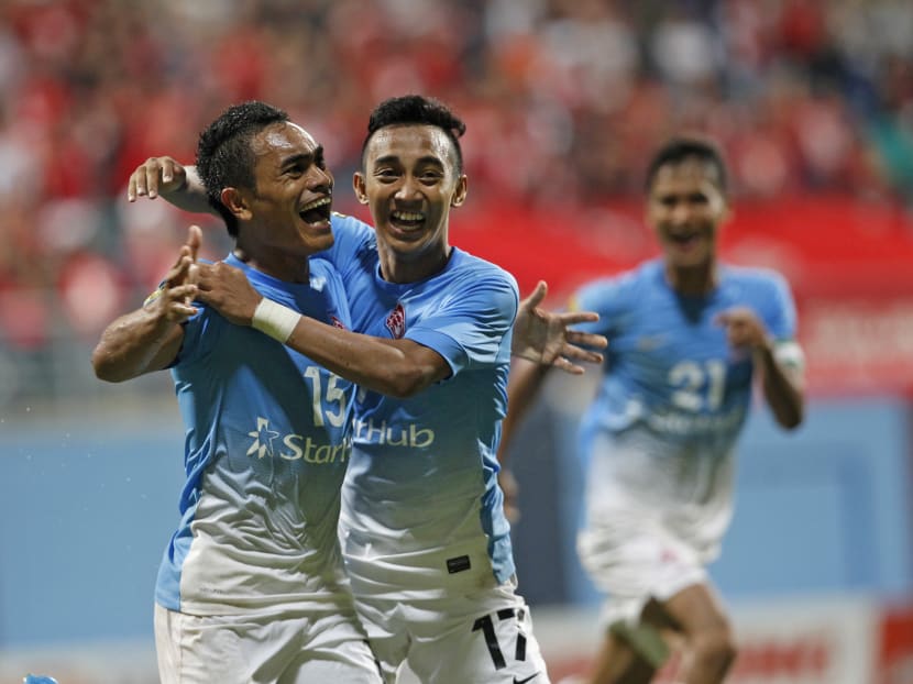 Lions XII players celebrating after Sufian Anuar scores a hat-trick against Pahang FA during the Malaysian Super League on April 15, 2014. Photo: Wee Teck Hian