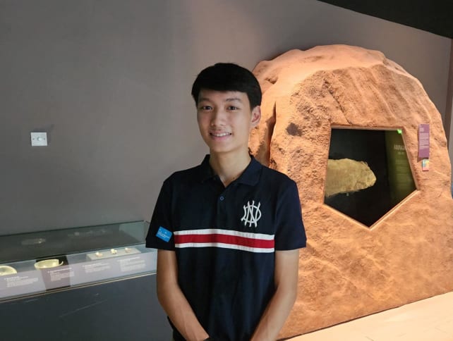 Mr Lee I-Shiang with the Singapore Stone at the National Museum of Singapore on Sept 29, 2023.