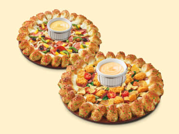 In the mood for a cheesy Christmas feast? Time to order some pizza