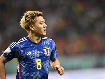 Japan's midfielder Ritsu Doan celebrates scoring his team's first goal during the Qatar 2022 World Cup Group E football match between Japan and Spain at the Khalifa International Stadium in Doha on Dec 1, 2022.