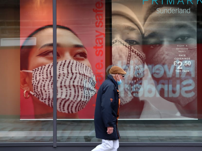 A man wearing a face mask in Sunderland on Oct 10. The UK is working with like-minded partners such as Singapore to strengthen institutions that can collectively fight one of the gravest challenges of our times.