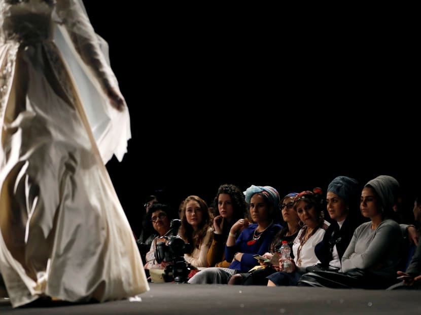A model walking down the runway during an event dubbed, Modest Fashion Day, the first of its kind in Israel, whereby designers showed off their clothing creations aimed at Orthodox Jewish women who adhere to strict dress codes, in Jerusalem on Feb 23, 2017. Photo: Reuters