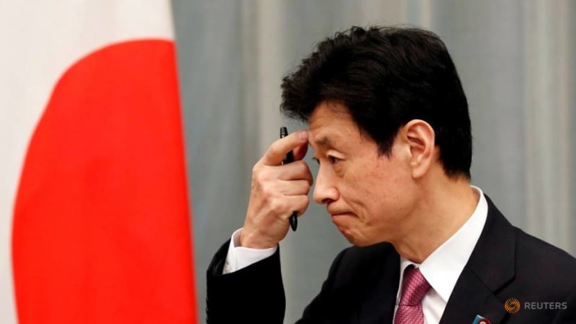 Japan economy minister defends his job after COVID-19 lockdown criticism Japan economy minister defends his job after COVID-19 lockdown criticism