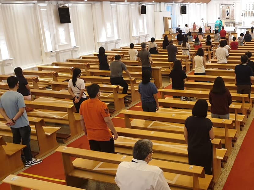Catholics attending weekend Mass at the Church of the Sacred Heart along Tank Road. Catholics attending weekend Mass at the Church of the Sacred Heart along Tank Road.