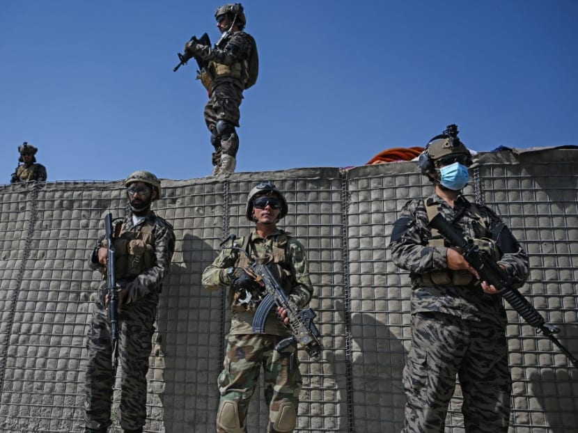 Members of the Taliban Badri 313 military stand near the destroyed Central Intelligence Agency (CIA) base in Deh Sabz district northeast of Kabul on Sept 6, 2021 after the US pulled all its troops out of the country.