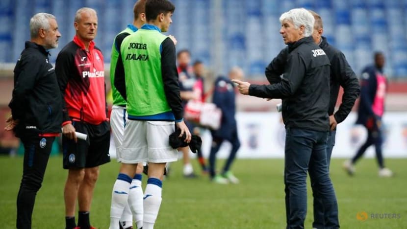 Soccer-Atalanta clinch Champions League spot with Genoa win Soccer-Atalanta clinch Champions League spot with Genoa win
