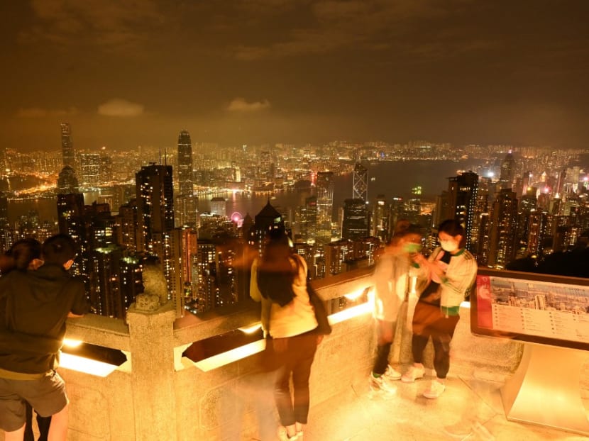 A view from the Peak of Hong Kong and Kowloon is seen after the lights were turned off to mark the Earth Hour environmental campaign on March 27, 2021.