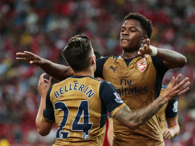 Arsenal's Chuba Akpom (right) celebrates scoring their fourth goal with Hector Bellerin. Photo: Reuters
