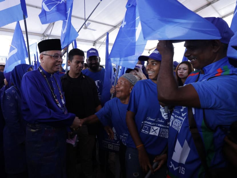 Malaysia Prime Minister Ismail Sabri Yaakob (left) of the United Malays National Organisation (Umno) greets supporters at the nomination centre in Bera, in Malaysia’s Pahang state on Nov 5, 2022.